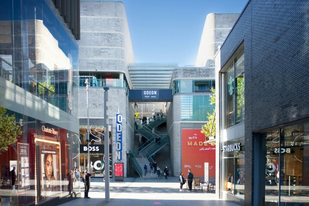 A city street filled with lots of tall buildings